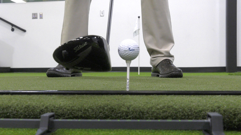 Golf mat with ball and tee